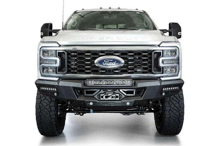 White Ford Superduty truck's front end showcasing the ADD F810335070103 black Phantom winch bumper, model years 2023-2024