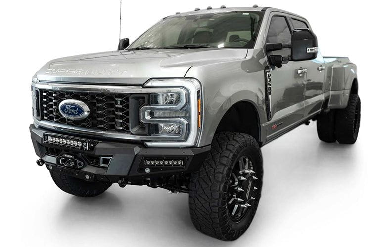 White Ford Superduty truck's front end showcasing the ADD F810335070103 black Phantom winch bumper, model years 2023-2024