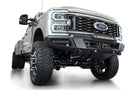 White Ford Superduty truck's front end showcasing the ADD F810335070103 black Phantom winch bumper, model years 2023-2024