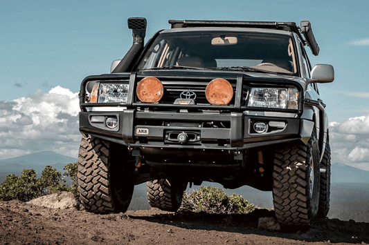 ARB 3413190 Toyota Land Cruiser 2003-2007 Deluxe Front Bumper 100 Series Winch Ready with Grille Guard, Black Powder Coat Finish