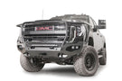 Front view of a black GMC truck featuring the Fab Fours Matrix bumper, winch-ready with a full guard design.