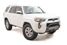 White Toyota truck with a Fab Fours hidden front bumper pre-runner and winch guard, suitable for 2014-2024 4Runners.