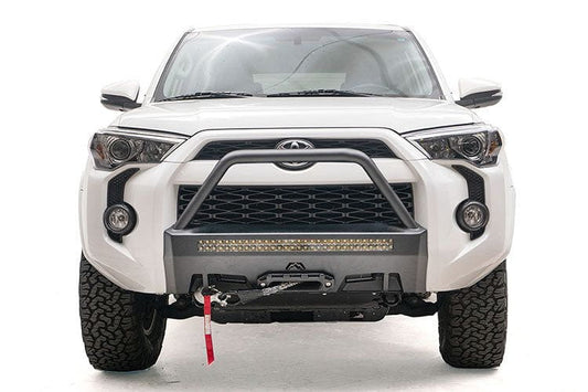 White Toyota 4Runner front end with a Fab Fours hidden bumper high guard, designed for winching and rugged terrain.