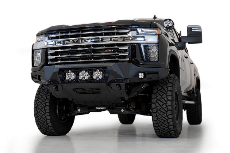 Front view of a black Chevy truck featuring a large ADD F270014100103 Bomber Black front bumper, designed for Silverado 2500/3500 model