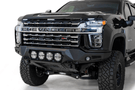 Black Chevy Silverado 2500/3500 truck front end showcasing the ADD F270014110103 Bomber Black front bumper, designed for 2020-2022 models