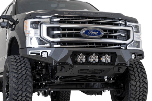 Black Ford truck's front end showcasing an ADD Bomber Black bumper F160014100103, tailored for 2017-2022 F250/F350 Superduty vehicles