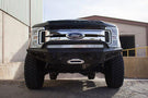 Black Ford F250/F350 Superduty pickup truck equipped with ADD Honeybadger front bumper F167382840103, suitable for winches and additional light mounts