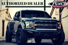 Black Ford F250/F350 Superduty pickup truck equipped with ADD Honeybadger front bumper F167382840103, suitable for winches and additional light mounts