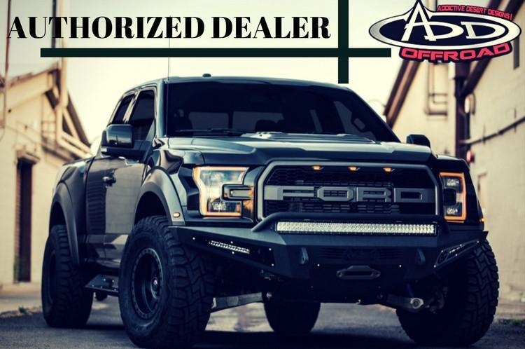 Black Ford F250/F350 Superduty pickup truck equipped with ADD Honeybadger front bumper F167382840103, suitable for winches and additional light mounts